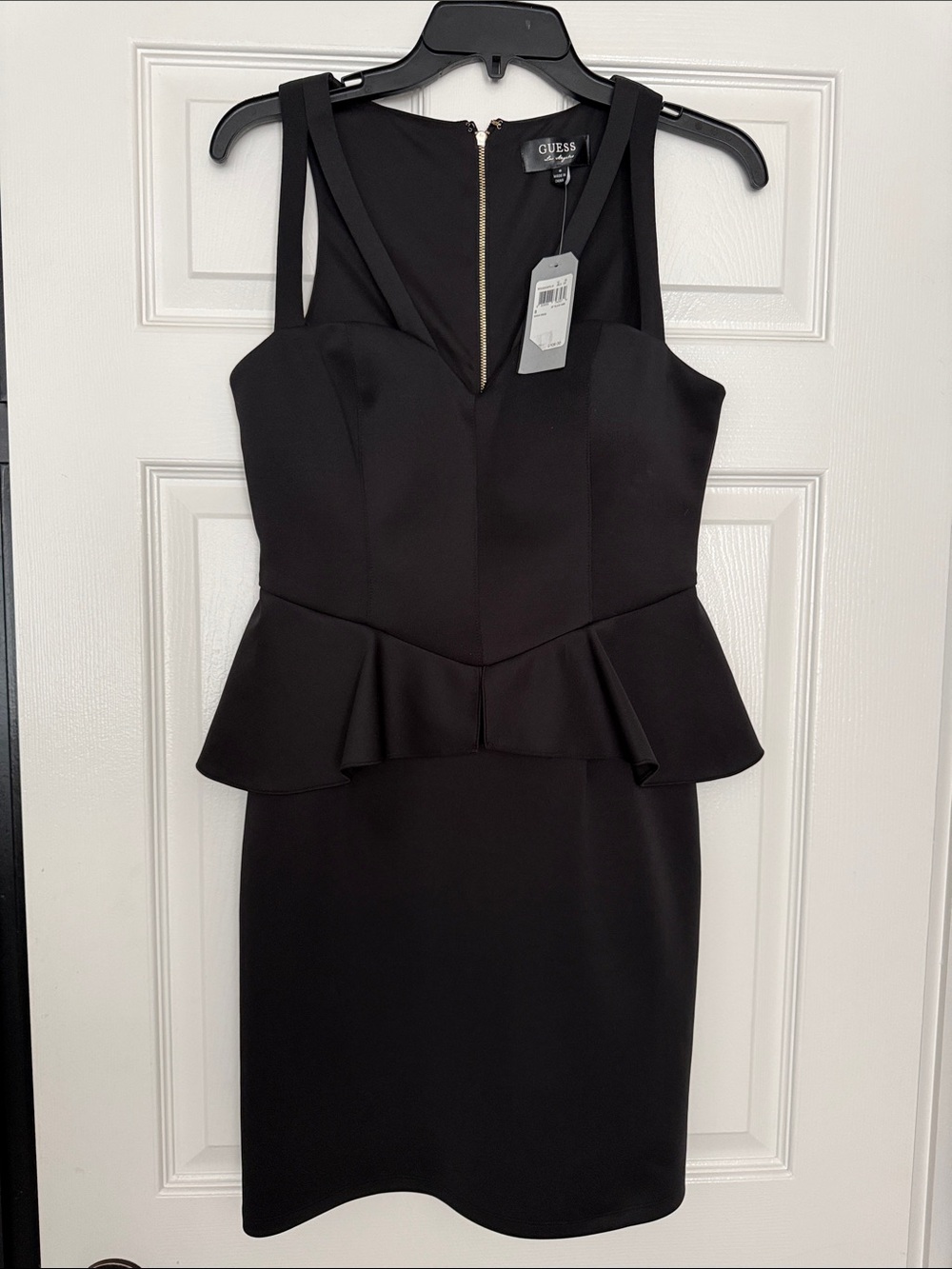 GUESS Black Peplum Mini Dress with sweetheart V-Neck and 2 cutouts